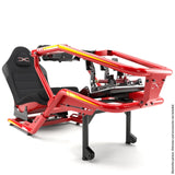 FX1 Formula cockpit in red and yellow with wheel base and pedal setup