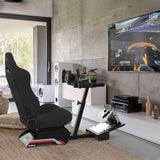 Compact 2.0 sim racing cockpit in a home entertainment room